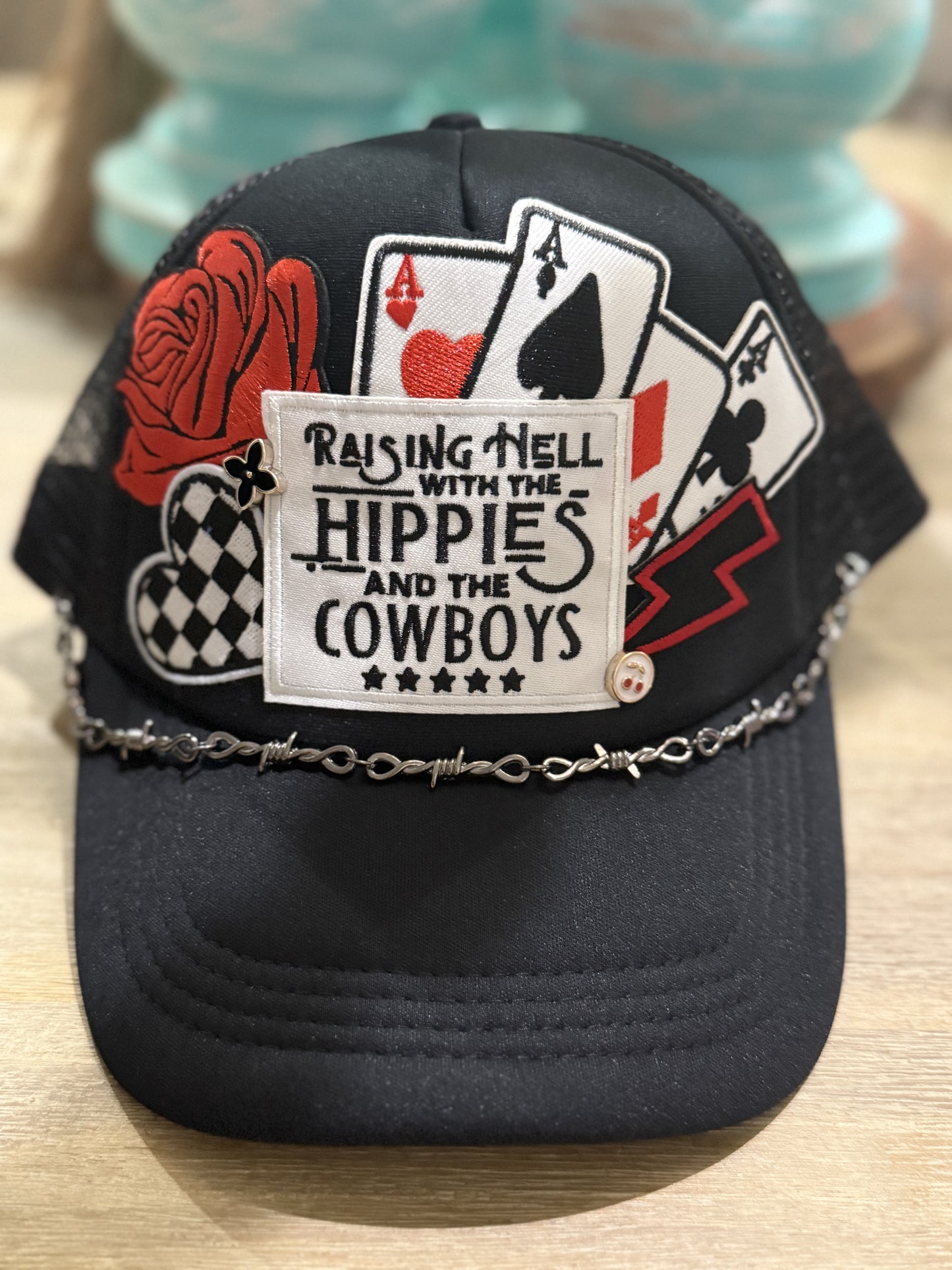 Hippies and Cowboys with chain and pins