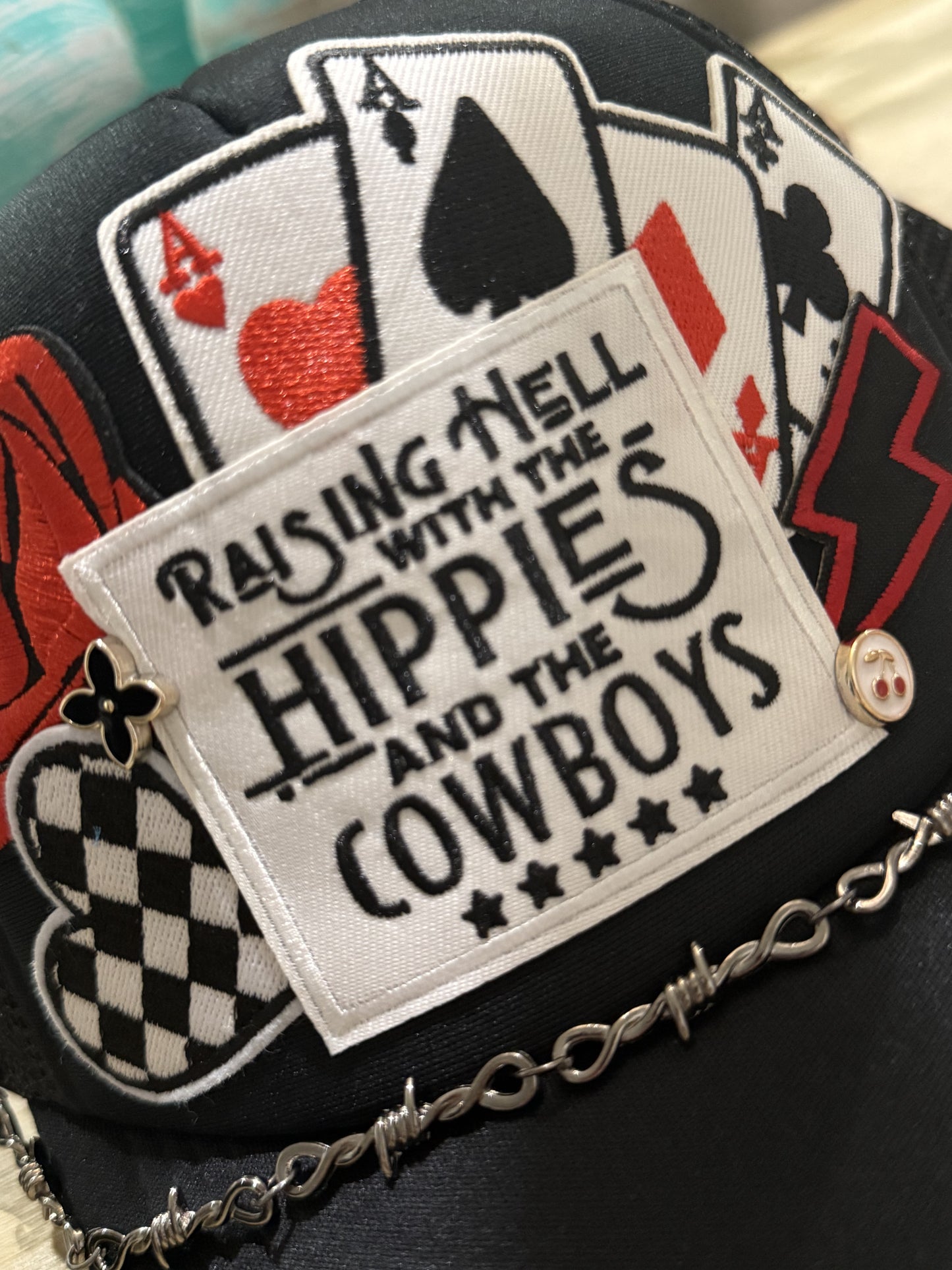 Hippies and Cowboys with chain and pins
