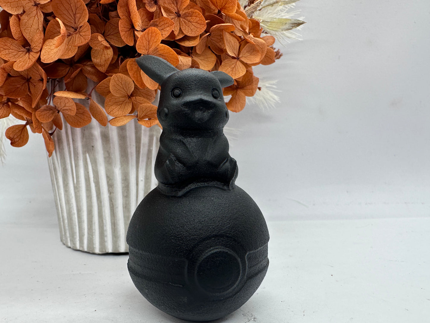 Blk Obsidian Poke Character on Ball