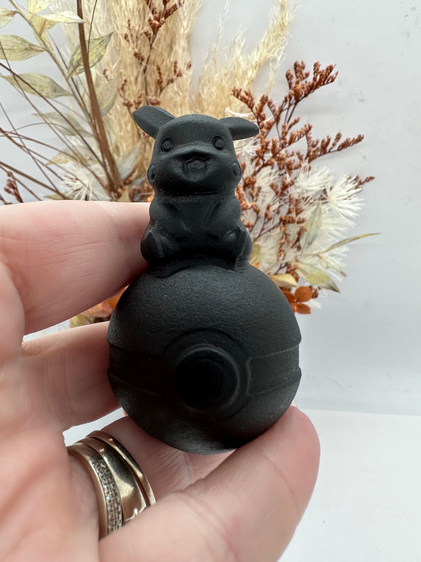 Blk Obsidian Poke Character on Ball